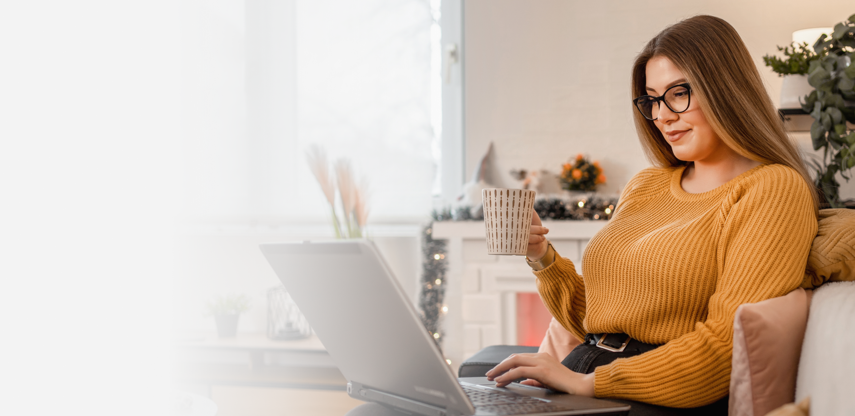 Woman reading at a laptop